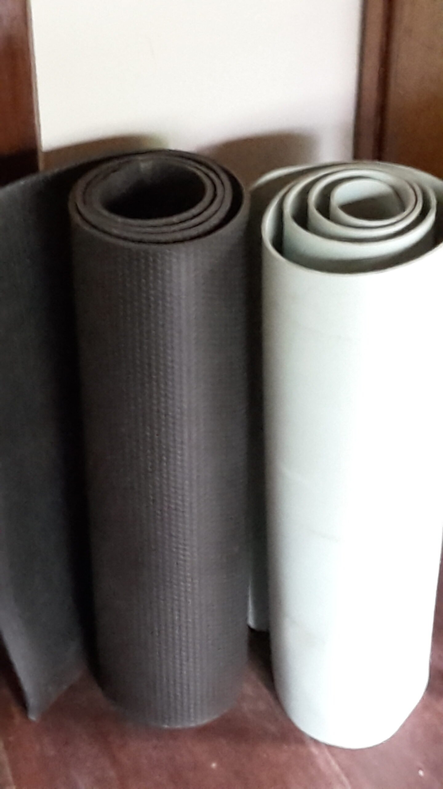 Yoga Retreat Villa Ubud Near Yoga Barn Rolled yoga mats ready for practice at Samastiti Villas Ubud.