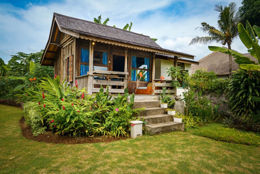 The Joglo by the Sea, an antique Javanese teak house rebuilt in a beachfront garden in Temukus, North Bali